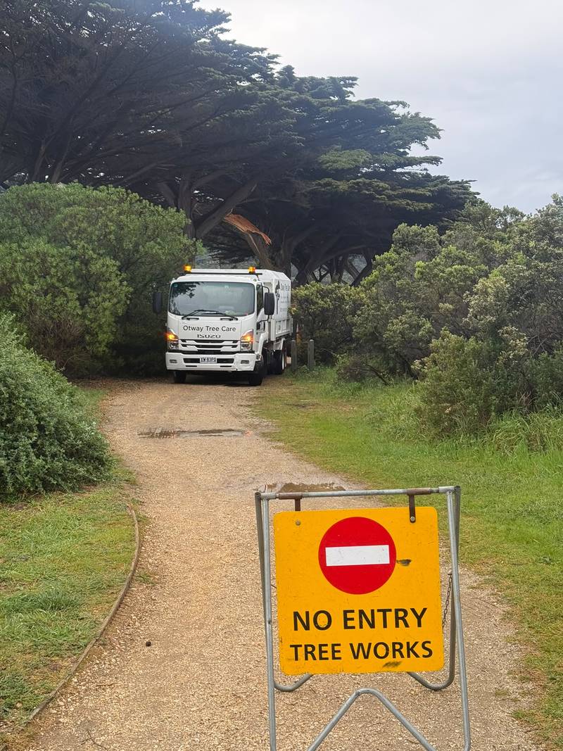 No Entry Tree Works sign across a foreshore walking track, with the Otway Tree Care truck behind